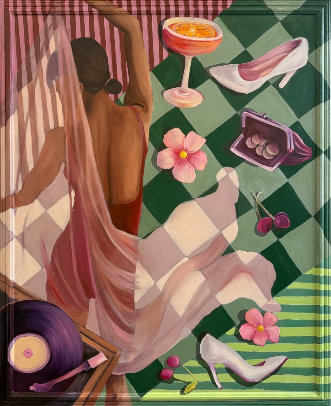 Seen from behind, a woman in a red swimsuit and sheer pink wrap sits on a green checkerboard scattered with white heels, cherries, pink flowers, a coin purse, a cocktail and a record player.